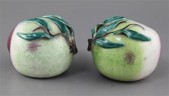 A pair of Chinese enamelled porcelain models of peaches, 19th century, 16cm